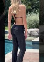 Pantalone a zampa tempestato di cristalli